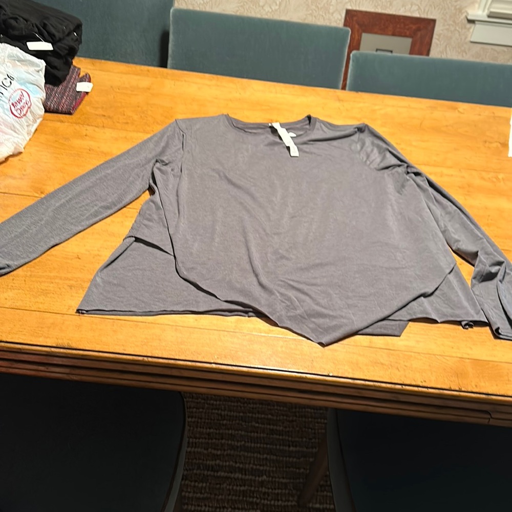 Excellent condition L/sleeve grey sz 8 multi layer top. Soft fabric.